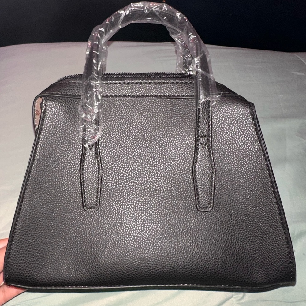 Black purse with strap